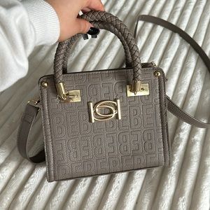 SOLD BEBE cross body long strap taupe, gold detailing, never worn, not with tags